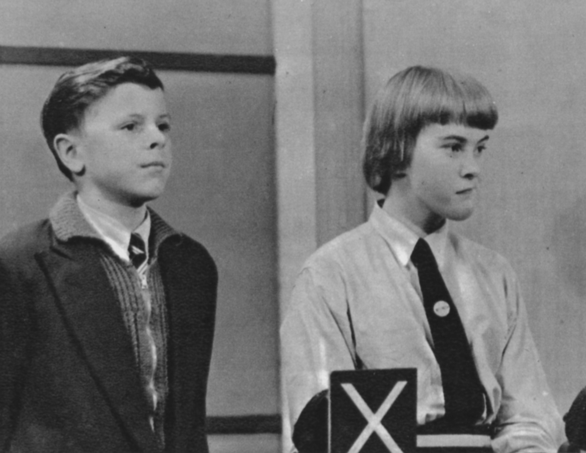 Two contestants in school uniform